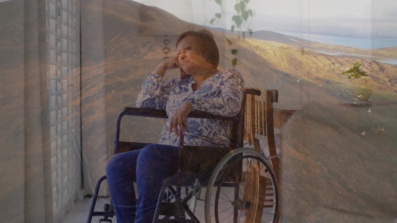 Animation of landscape overlay over woman in wheelchair