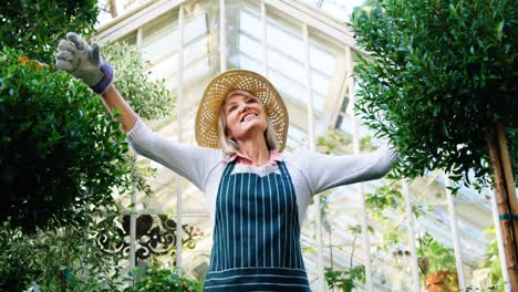 mature woman with arms outstretched