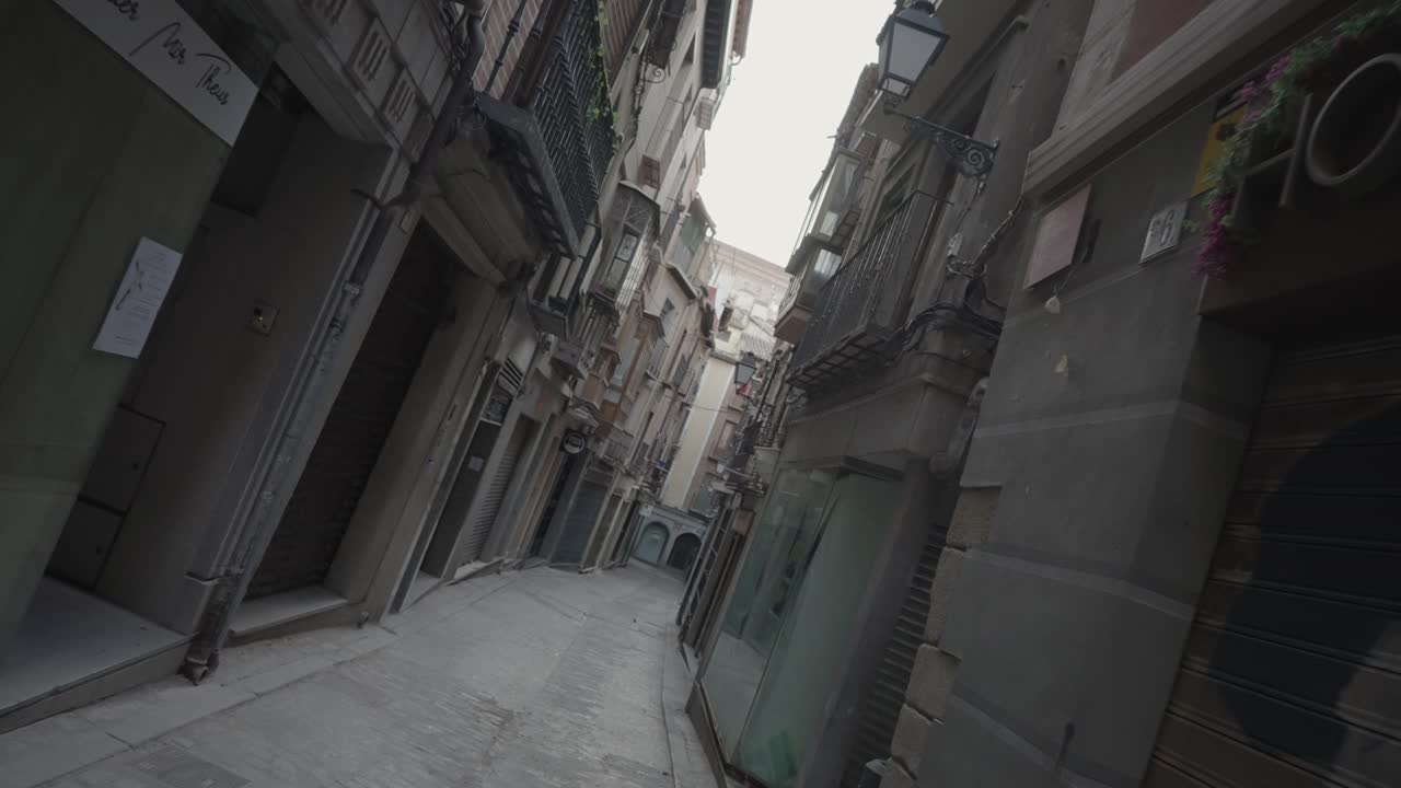 A narrow street with old buildings