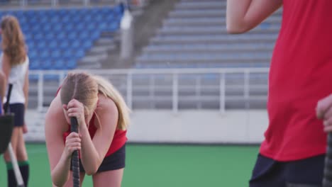 Female-hockey-players-sad-after-a-match-