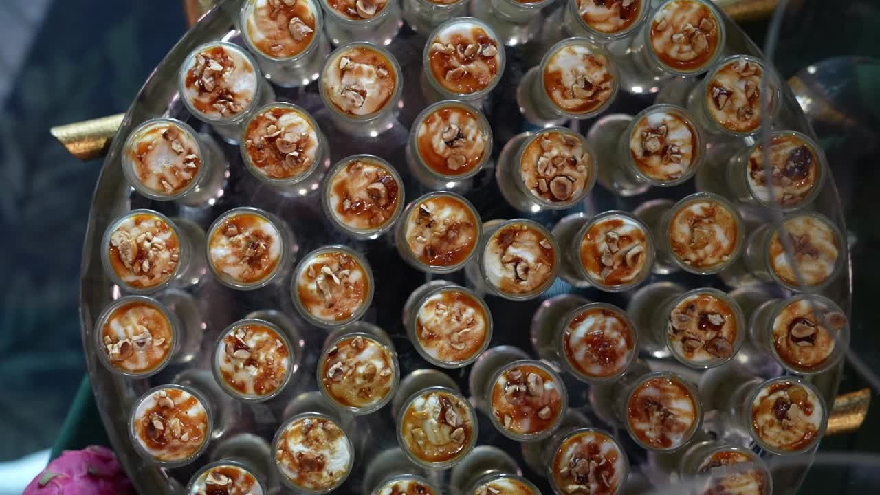 A table contains dessert cups, high angle shot