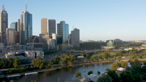 aerial perspective of fed square and melbourne australia's yarra river during afternoon light