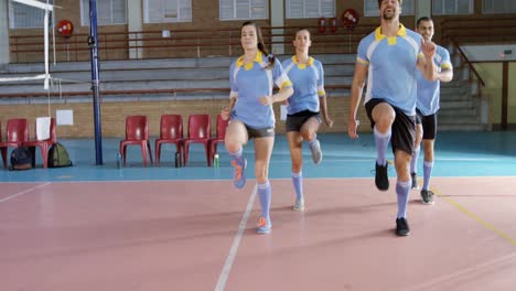 Volleyball-players-exercising-in-the-court-4k