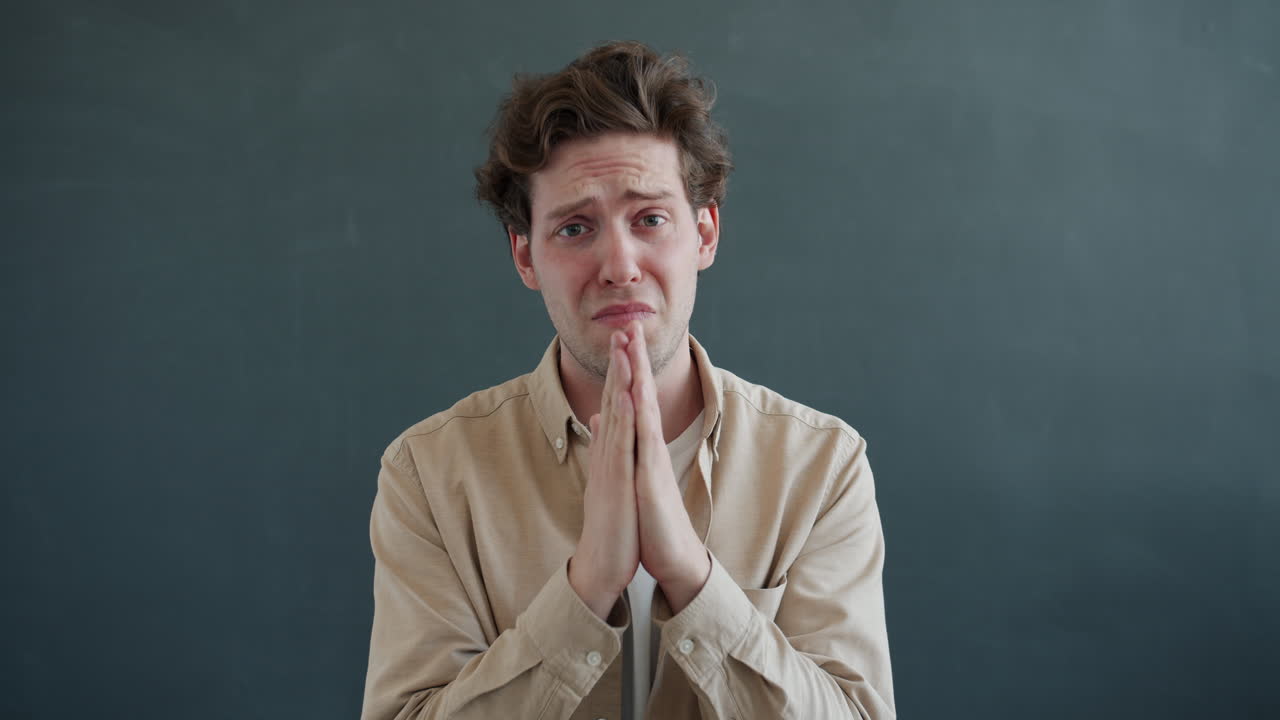 Man Appearing Sad and Desperate