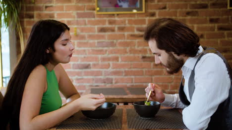 happy couple taking photo on a date