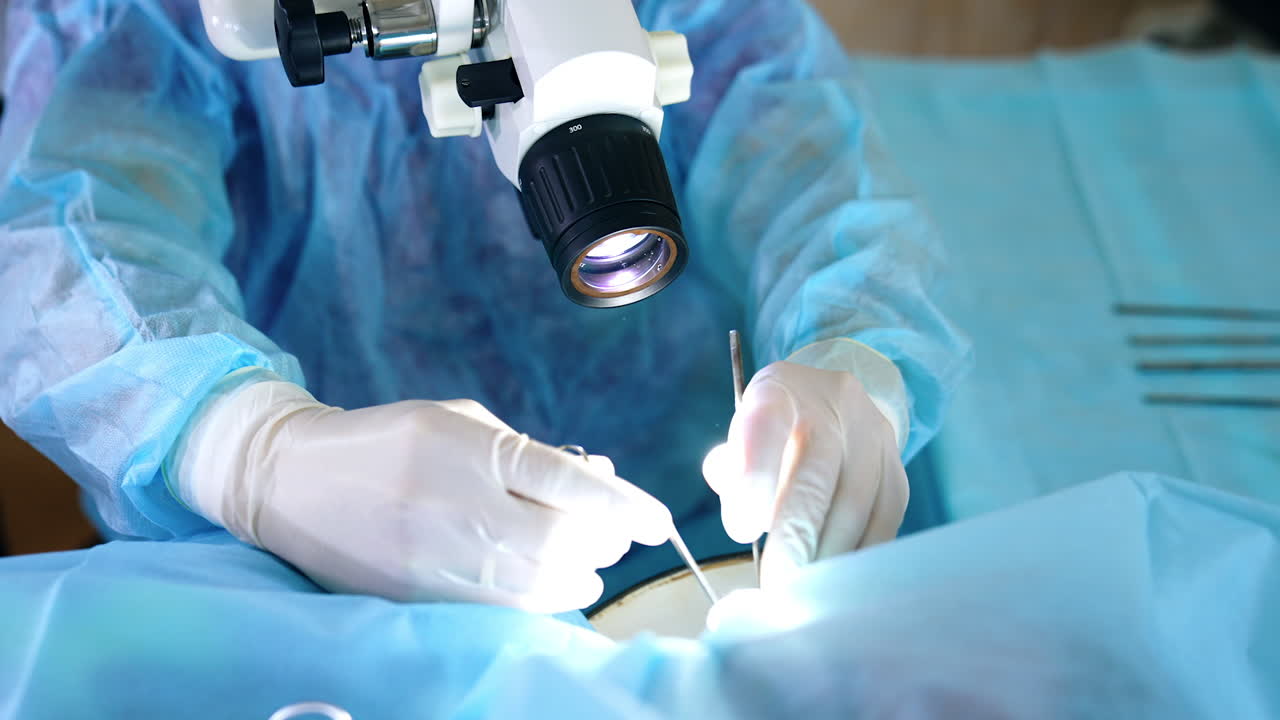 Medic wearing gloves uses metal tools. Unrecognized doctor looks at microscope. Close up.