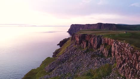 Sunset in the isle of skye above the gorgeous coast of neist point