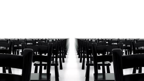 moving away from the rows of chairs.