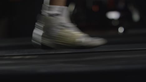 person walking on treadmill