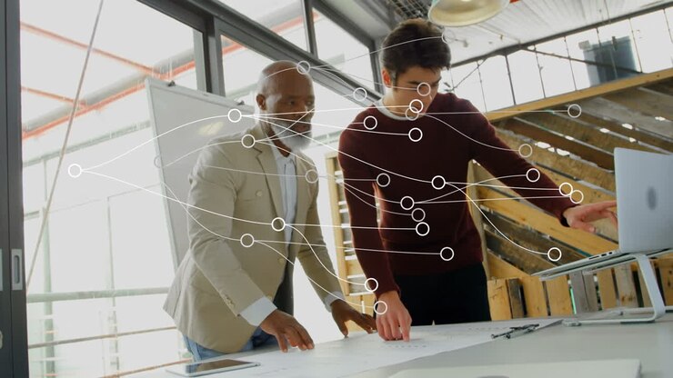 Animation of network of connections over two diverse businessmen discussing over a plan