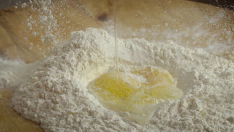 flour with egg in slow motion.