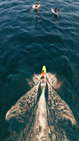 people paddleboarding on the ocean