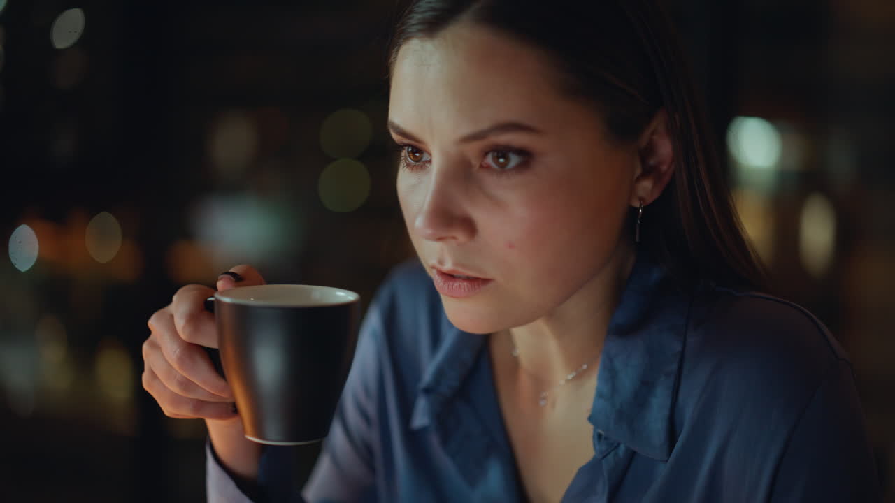 Freelancer hands typing laptop keyboard working on project late evening closeup
