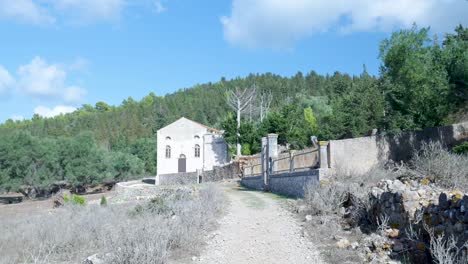 abandoned church in a hilly landscape