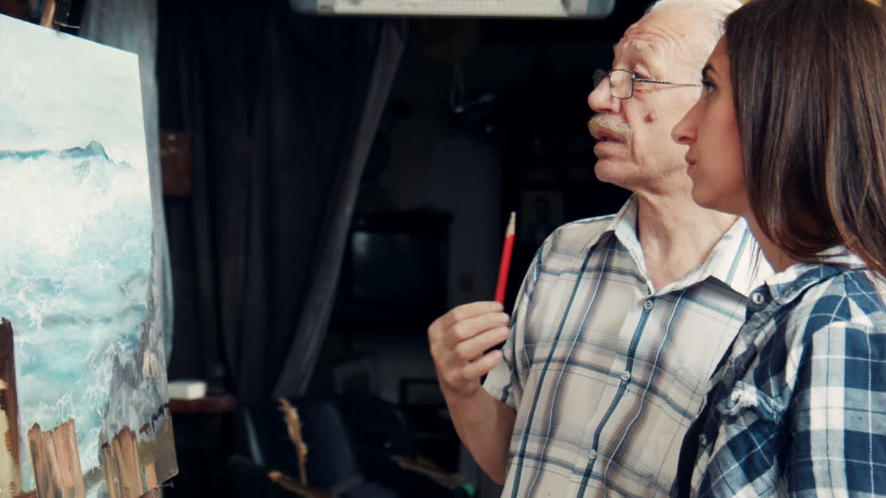 Art Student Learning from Senior Artist