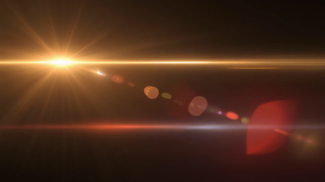Luminoso effetto flare dorato su sfondo scuro
