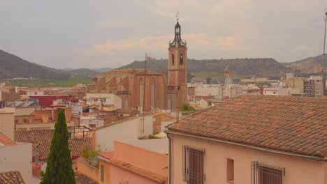 high angle shot over an old gothic church inside the city of sagunto, spain at daytime