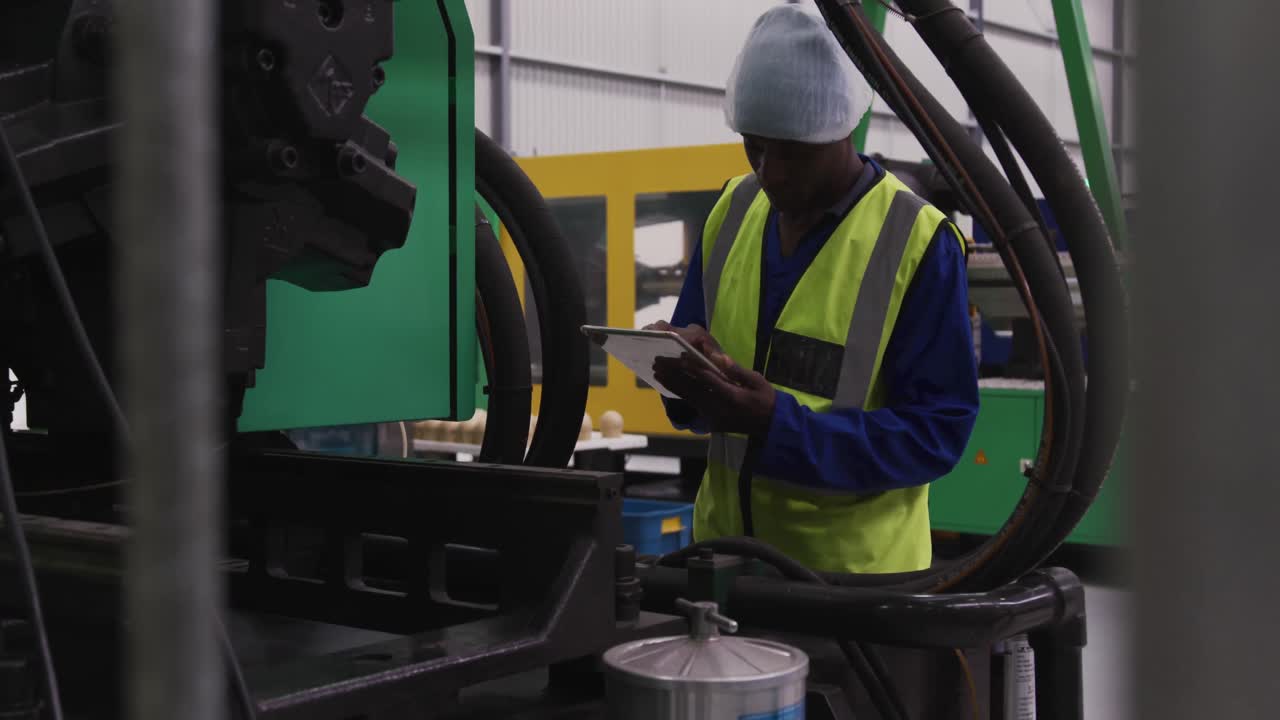 Warehouse worker using a digital tablet