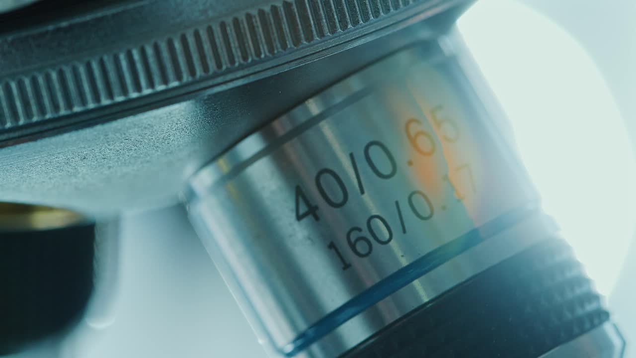 Macro View of Objective Lens of Microscope in Laboratory