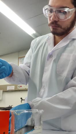 close-up of lab work with safety gear