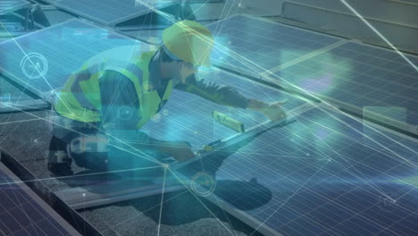 animation of network of connections over solar panels and caucasian male engineer