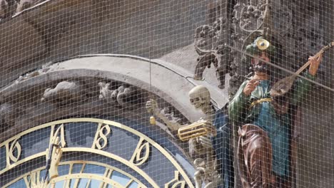 Detail of Prague Astronomical Clock with Skeleton and Musician Figures