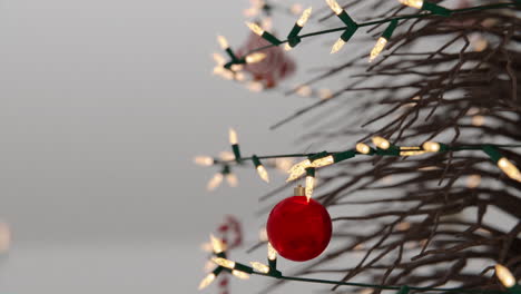 close-up of christmas tree ornaments and lights