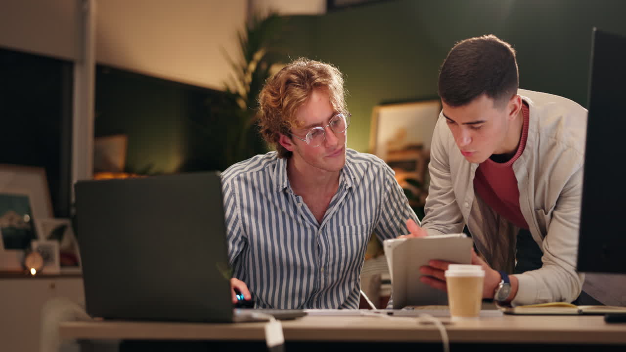 Two men working together on a project