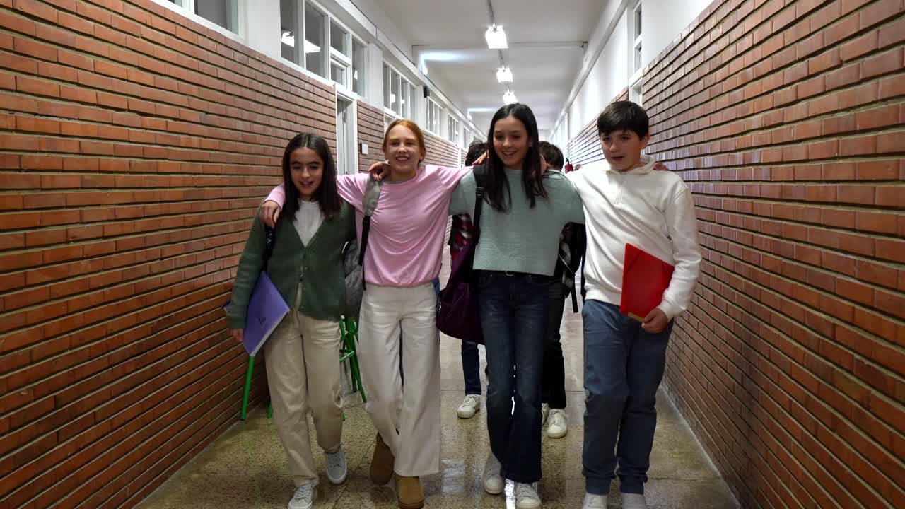 Group of Students Walking in School Hallway