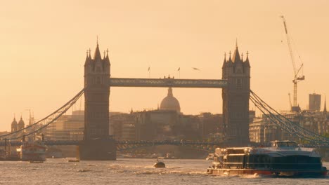 late afternoon light behind tower bridge, london, uk