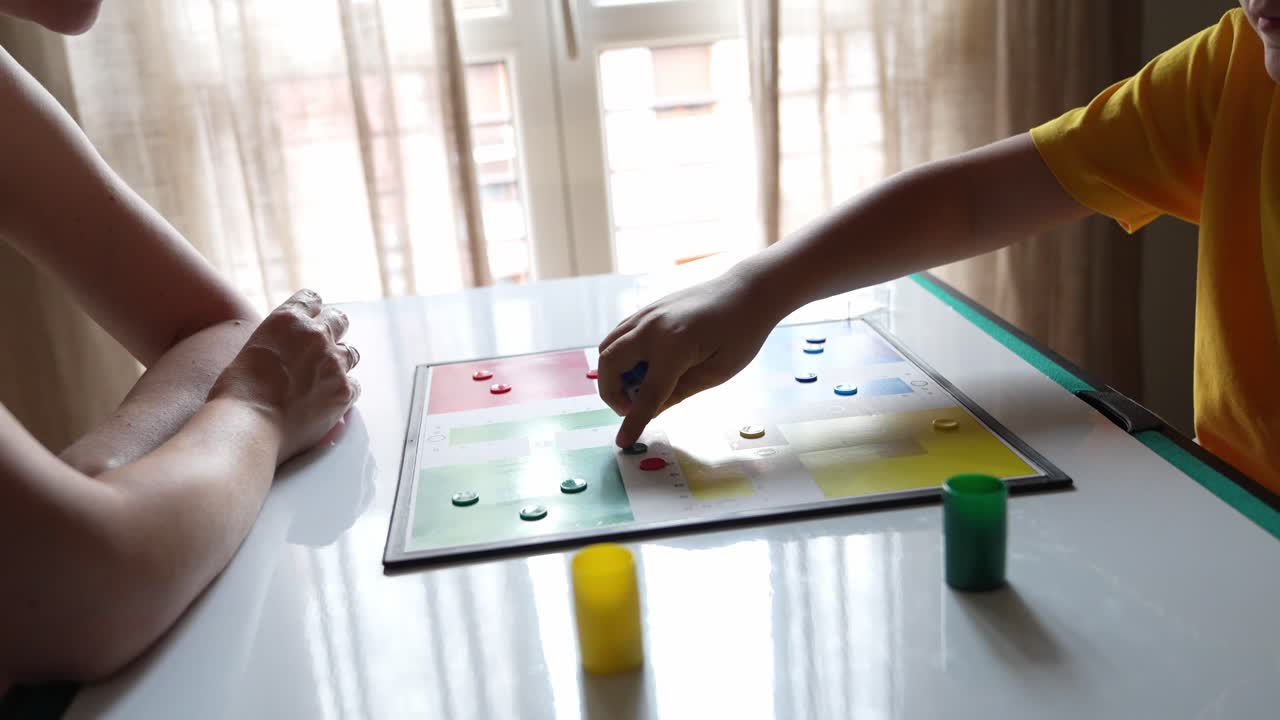 Playing Ludo Board Game