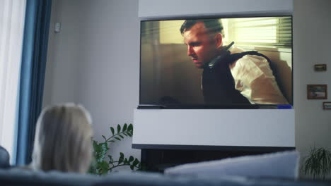 woman watching movie on tv