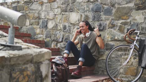 Mixed-race-man-laughing-on-the-phone