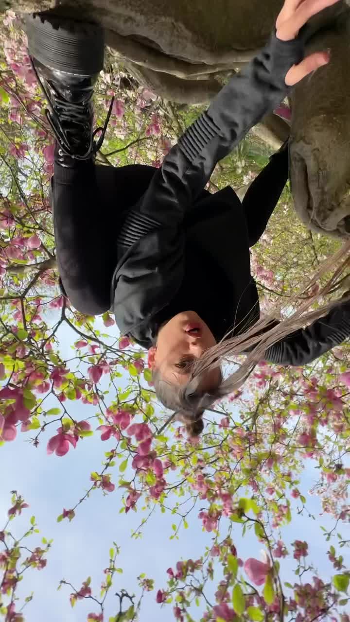 Woman Posing Amongst Spring Flowers