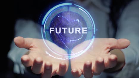 las manos femeninas muestran el holograma del futuro.