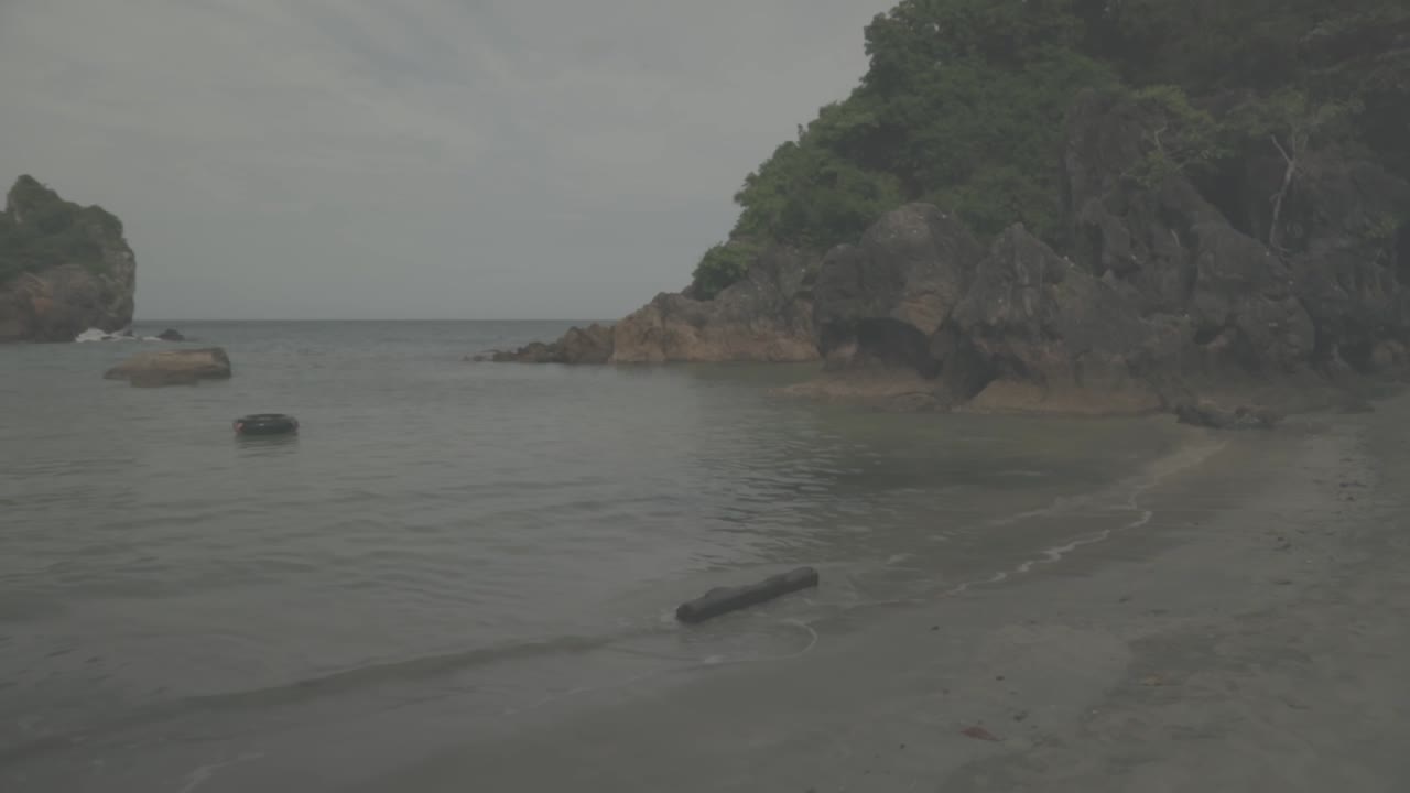 Walking on the beach in Bangkok. (Slowmotion -Angle 002)