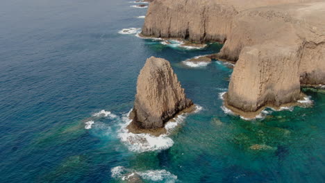 Wonderfull-Drone-shot-in-4k-of-the-Roque-del-Farallón,-Farallón-de-Tábata-or-Roque-Partido,-is-an-imposing-rock-formation