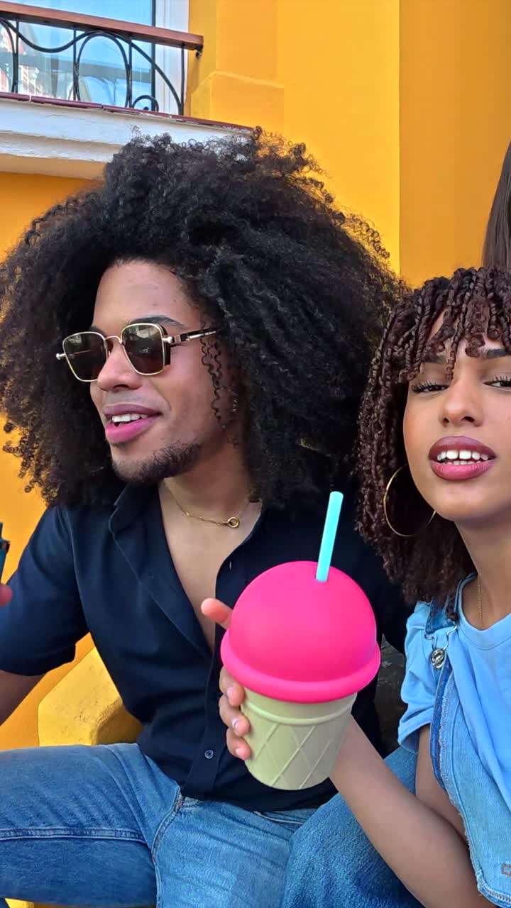 A group of friends enjoying ice cream and posing for a photo