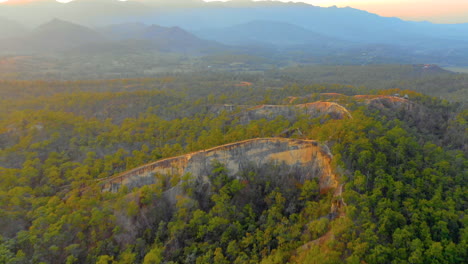 Scenic-aerial-view-of-the-Pai,-Thailand-landscape-at-sunset