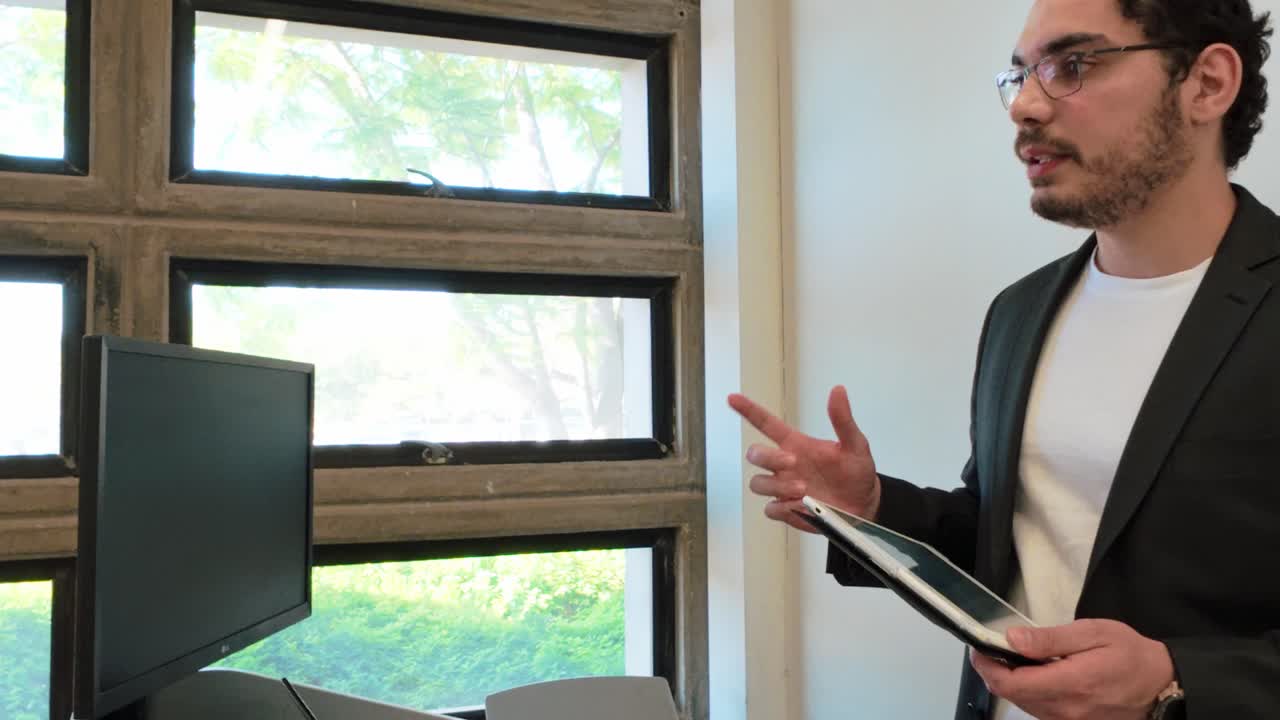 Man Presenting in an Office