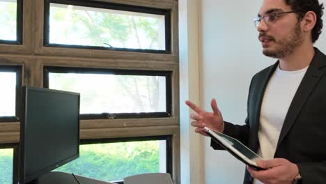 man presenting in an office