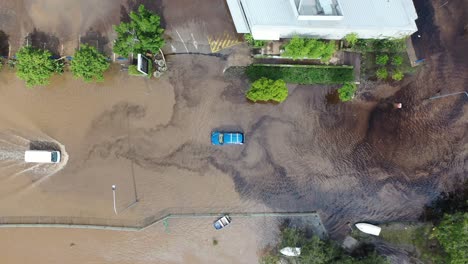 top down view of cars stuck in flood waters