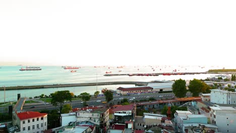 Cinematic-Drone-Shot-of-Cargo-Ships-Leaving-Istanbul