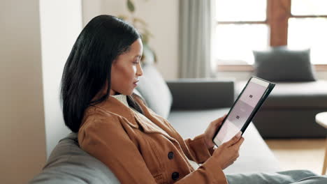 Tablet,-sofa-and-woman-reading-website-information