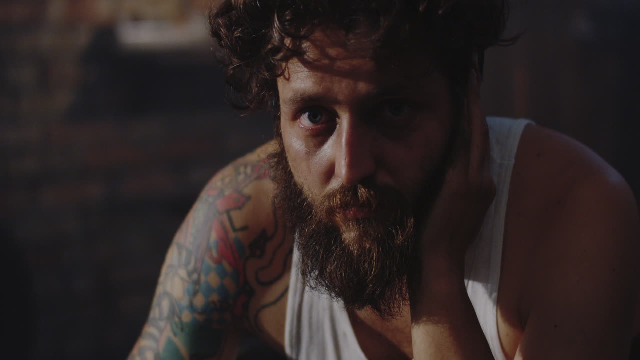 Portrait of a Man with a Tattoo