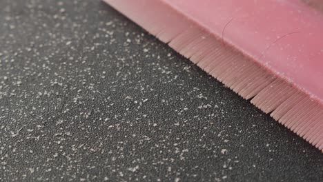 Dandruff-and-hairs-on-white-background