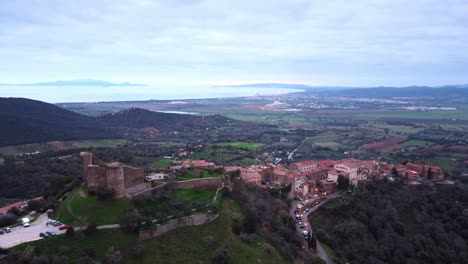 Drone-on-the-castle-of-Scarlino,-Tuscany,-Italy