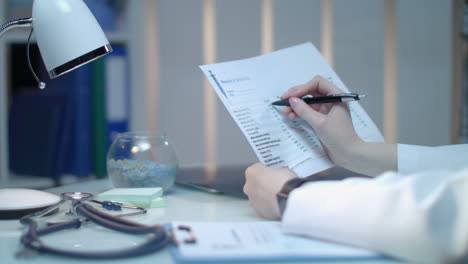 female doctor hand check medical analysis result. health care medicine