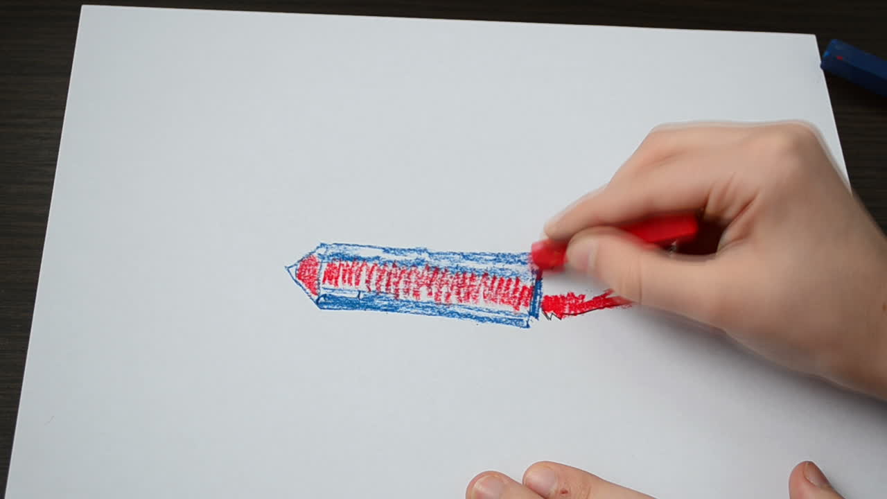 Disegniamo il razzo nello spazio. Processo di disegno.