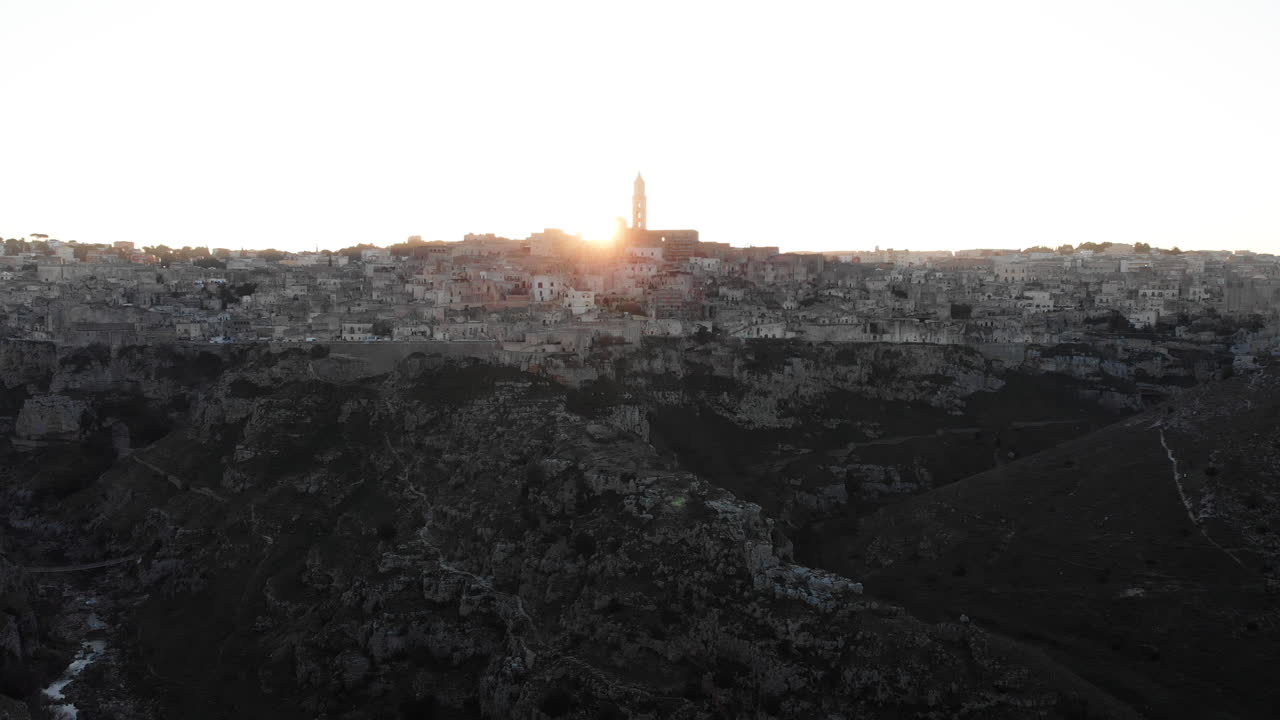Stunning Sunset Behind The Quiet City Of Matera, Italy - aerial drone